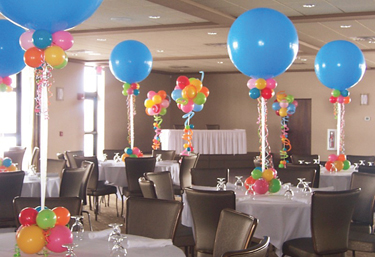 Corporate tables set with balloon centerpieces